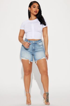 Shorts de Denim Rasgados de Corte Alto y Lavado Claro