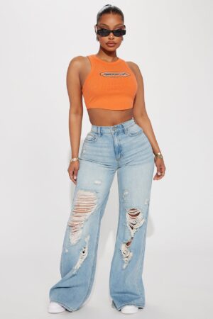 Jeans Anchos Rasgados y Lavados a la Piedra