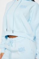 Conjunto de Pantalón y Buzo de Frisa en Celeste Claro