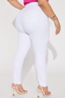 Jeans Ajustados Tiro Alto con Efecto Push Up y Detalles Rotos