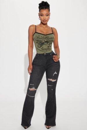 Jeans Elásticos Rasgados con Campana en Lavado Negro